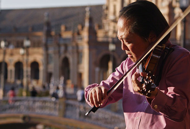 Photo of a man playing the violin